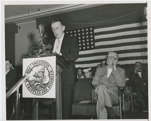 Unidentified man speaking at an ICD event