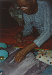Needlework: Kam Phang works on the Komrope Trie, 1987