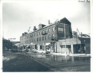 Chelsea Street in Charlestown, featuring Globe Discount, Madden's and the Monroe Cafe