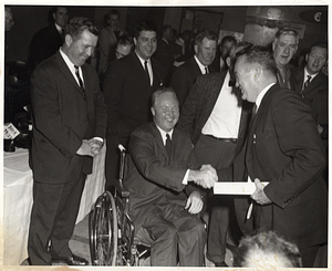 Mayor John F. Collins laughing with Vice President Hubert Humphrey and unidentified men at unknown gathering