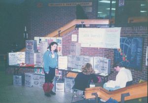 Students gather in the Saywer Building lobby (8 Ashburton Place) near a display for Suffolk University's Dead Day