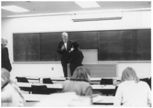 Suffolk University Professor Herbert Lemelman (Law) speaks with a student in classroom