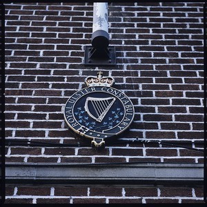 RUC crest on the outside of a building