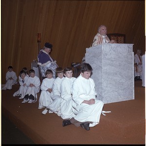 Catholic Bishop with a group of children at confirmation ceremony at the Catholic Church in the Flying Horse Estate, Downpatrick