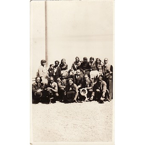 Reverend Dr. Wm. Frederick Fisher poses with a large group