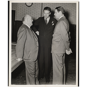 From left to right, J. Willard Hayden, Henry Cabot Lodge, Jr., and Maurice J. Tobin, conversing at the dedication and cornerstone laying ceremony for the Charles Hayden Memorial Clubhouse in South Boston