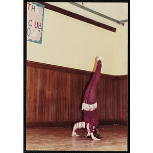 A Girl performing a handstand