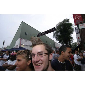 Torch Scholar Jordan Munson outside Fenway Park