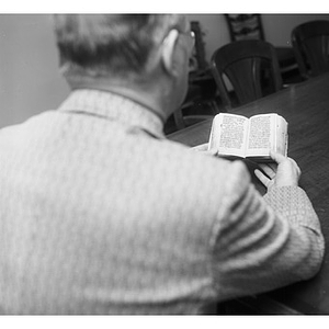 Patron reading the Dominican Prayer Book