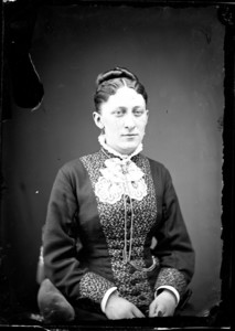 Portrait of a woman, seated