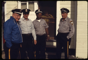 Police standing outside fair office