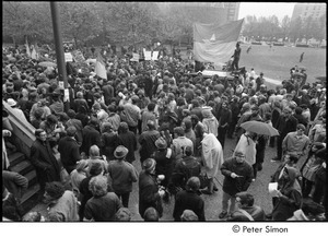 MIT war research demonstration: demonstrators gathered around an NLF flag