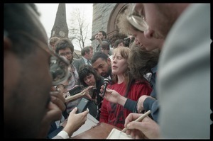 Scene outside the Hampshire County courthouse following acquittal in the CIA protest trial: Amy Carter being interviewed by the press