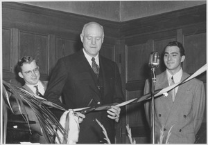 Ralph A. Van Meter cutting opening ribbon for WMUA