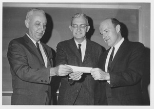 Edgar Ernest Lindsey standing indoors with Mr. Denison and Mr. Eldridge