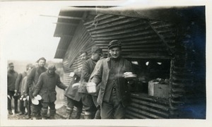 Chow line: American soldiers with mess kits in line for a meal