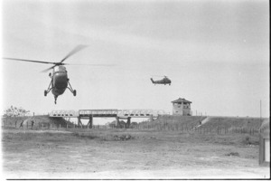 Helicopters arriving at staging area with dead Marines.