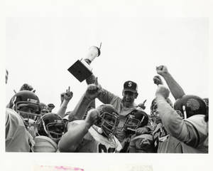Coach Vandersea celebrating with team (c. 1976-1984)