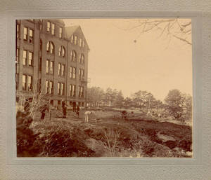 Working on the grounds outside the Springfield College dormitory, ca. 1898