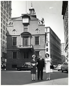 Mary Collins; Mark Bortman, Chairman of the Civic Committee of the People-to-People Program; and unidentified woman in front of the Old State House