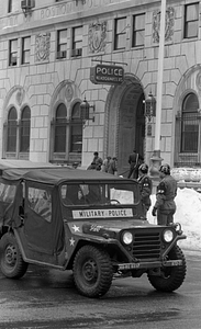 Military Police vehicle and Military Police officers in front of Boston Police Headquarters on Berkeley Street