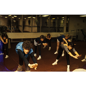 Women stretching in a gym