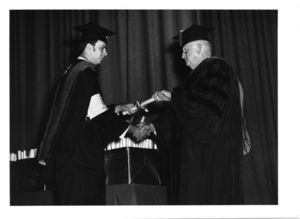 Student receives degree from Dean Michael R. Ronayne (CAS) at the 1970 Suffolk University commencement