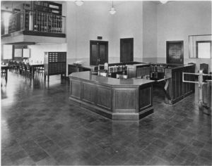 View of the circulation desk, turnstile, and card catalog at the Suffolk University library