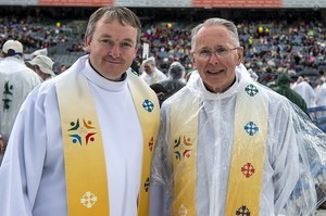 On the left, Fr Eddie Magee, from Portaferry, Co Down at the 2012 50th Eucharistic Congress, Final Day Ceremony, 17th June, at Croke Park GAA Stadium, Dublin