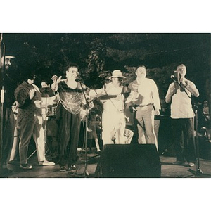 Musicians performing on the outdoor stage at Festival Betances.