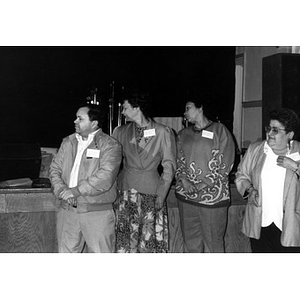 Inquilinos Boricuas en Acción Board members at a ceremony at the Jorge Hernandez Cultural Center.