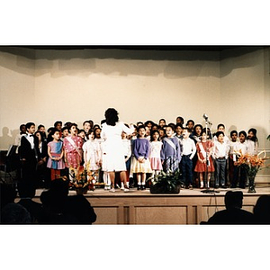Choir of schoolchildren performing at the ceremony celebrating the opening of the Villa Victoria Cultural Center.