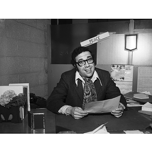 Professor Michael L. Woodnick at desk