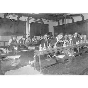 Male students in a chemistry class at the YMCA