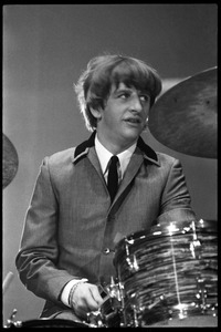 Ringo Starr on drums, in concert with the Beatles, Washington Coliseum