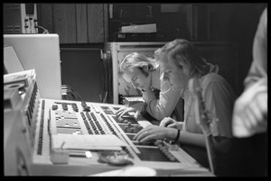 Stephen Stills (left) and Bill Halverson (sound engineer) working at the mixing board in Wally Heider Studio 3 while producing the first Crosby, Stills, and Nash album