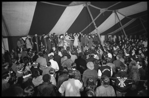 Yippies on stage under the circus tent at the Counter-inaugural ball, 1969