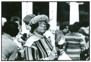 First National Women's Conference photographer with brownie camera