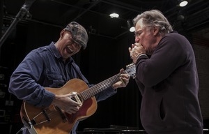 Guy Davis (left) and John Sebastian performing on stage during the Power of Song Award concert, Symphony Space, New York City