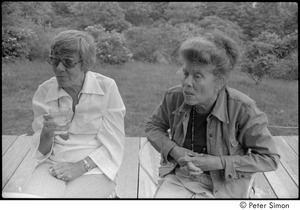 Ram Dass and dad at mum's: Phyllis Alpert and Andrea Simon seated on a deck