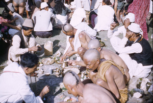 Priests preparing dough balls in Gokarna