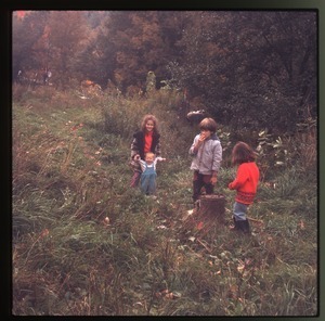 Children playing in a field, Montague Farm Commune