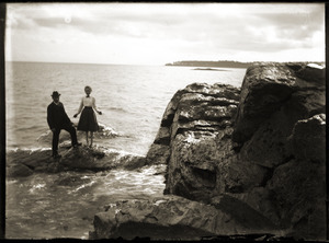 Couple on a rocky coast