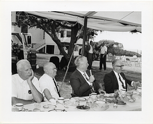 Mayor John F. Collins speaking at an outdoor luncheon