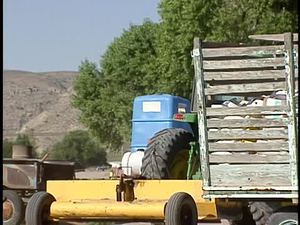 The Border Project; Mesilla Valley; Faubion in Tractor Yard; Tractor Sequence; Onion Picking