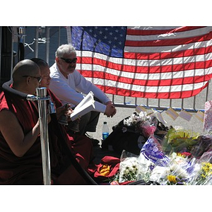 Monks at Boston Marathon makeshift memorial in Copley Square