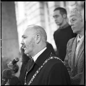 Alex Maskey, first Sinn Fein Lord Mayor of Belfast, laying a memorial wreath to commemorate the dead of two World Wars at the Cenotaph at City Hall, Belfast. A political gesture of great significance