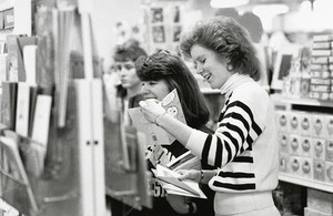 Boston College students shopping for greeting cards at a campus store