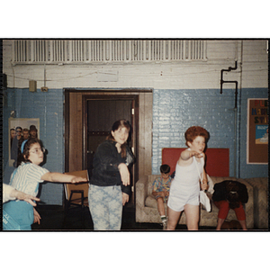 Three girls dancing in a circle