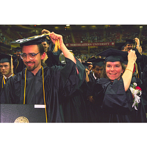 Graduates at commencement move their tassels to the left during the commencement ceremony